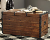 Prime Furniture - Ashley Furniture - Kettleby Storage Trunk - Storage Trunk / Brown - A4000096