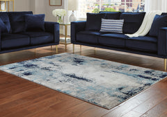 Prime Furniture - Ashley Furniture - Leonelle Rug - 7'10" x 10' Rug / White/Blue/Gray - R404871
