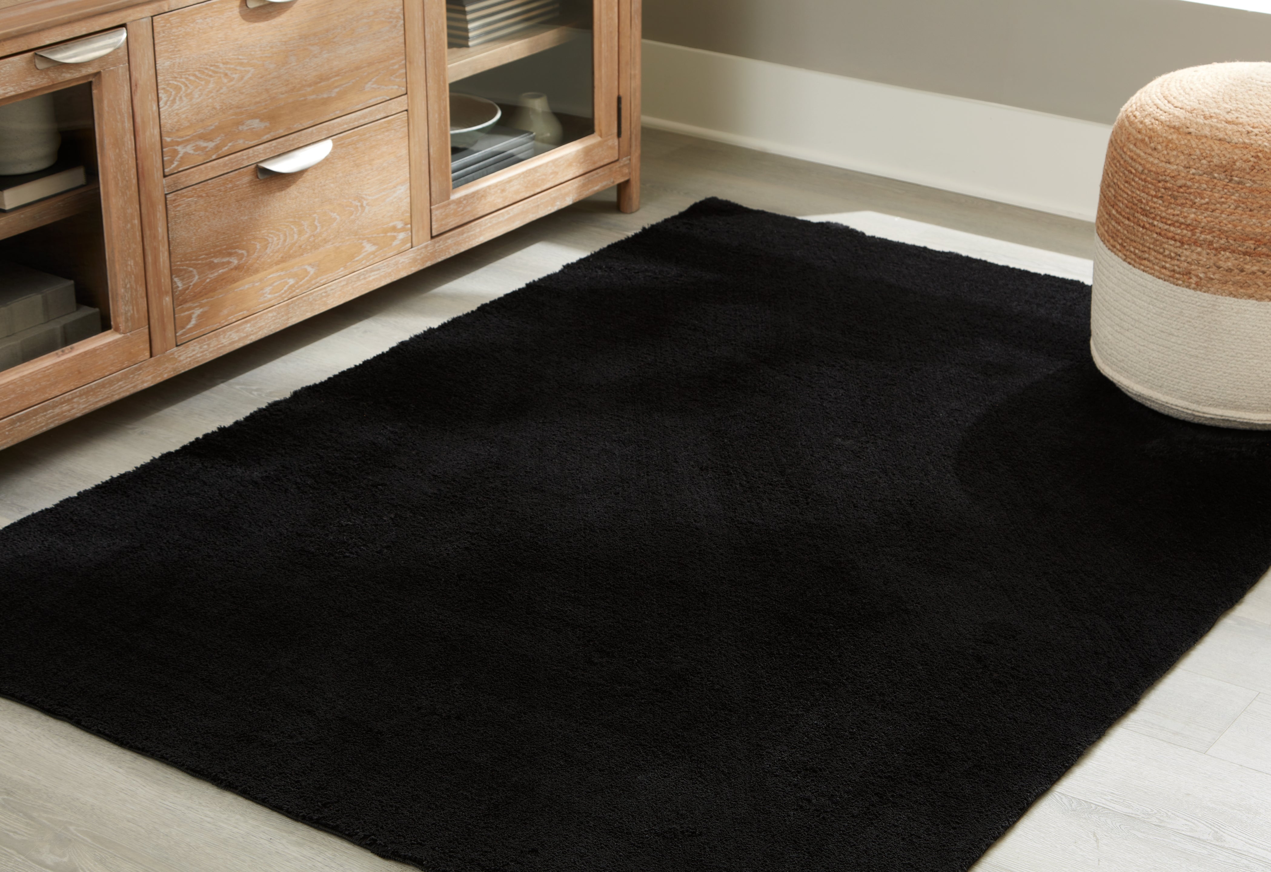 Prime Furniture - Ashley Furniture - Anaben Rug - 5' x 7' Washable Rug / Black - R406312