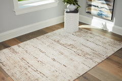 Prime Furniture - Ashley Furniture - Kasney Rug - 5' x 7' Rug / Cream/Brown - R406852
