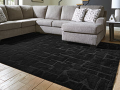 Prime Furniture - Ashley Furniture - Gibbswell Rug - Washable 8' x 10' Area Rug / Black - R407461