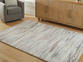 Prime Furniture - Ashley Furniture - Nace Rug - 7'6" x 9'6" Area Rug / Gray/Brown/White - R407471