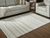 Prime Furniture - Ashley Furniture - Gadence Rug - 7'8" x 10' Area Rug / Ivory/Tan - R407641