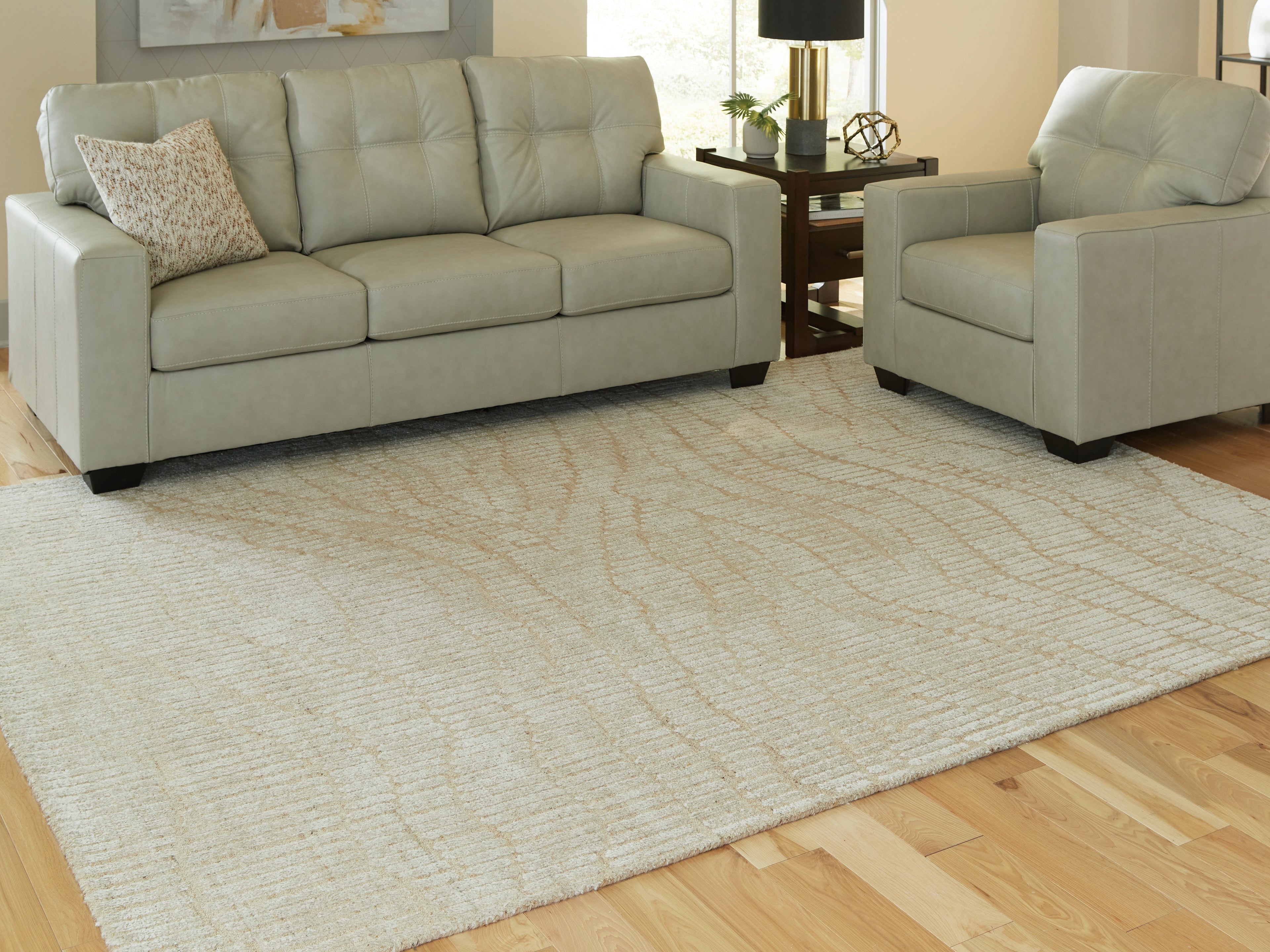 Prime Furniture - Ashley Furniture - Jaseena Rug - 7'8" x 10' Area Rug / Beige/Tan - R407721