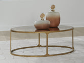 Prime Furniture - Ashley Furniture - Korajane Coffee Table - Oval Cocktail Table / Antique Gold - T399-0