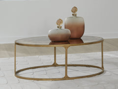 Prime Furniture - Ashley Furniture - Korajane Coffee Table - Oval Cocktail Table / Antique Gold - T399-0