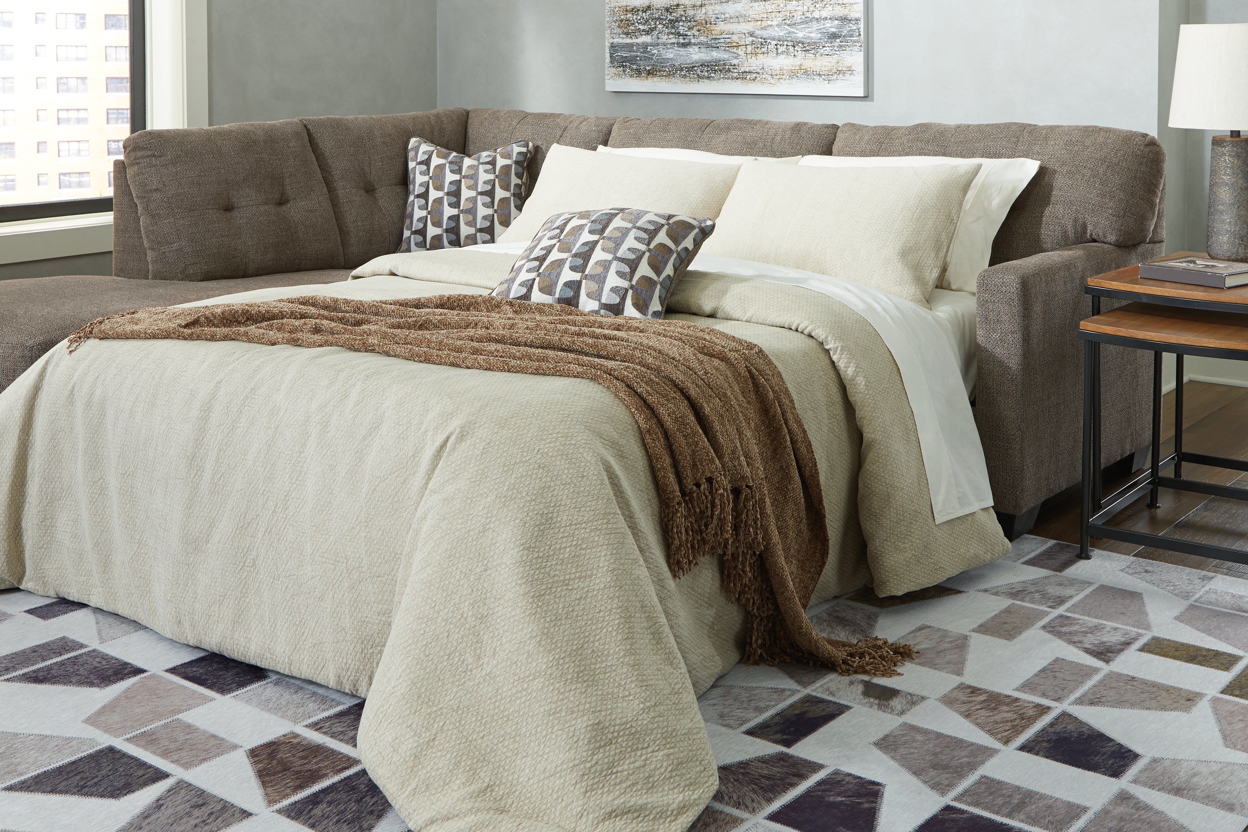 Prime Furniture - Ashley Furniture - Mahoney Sectional - RAF 2-Piece Sleeper Sectional with Chaise / Chocolate - 31005S3