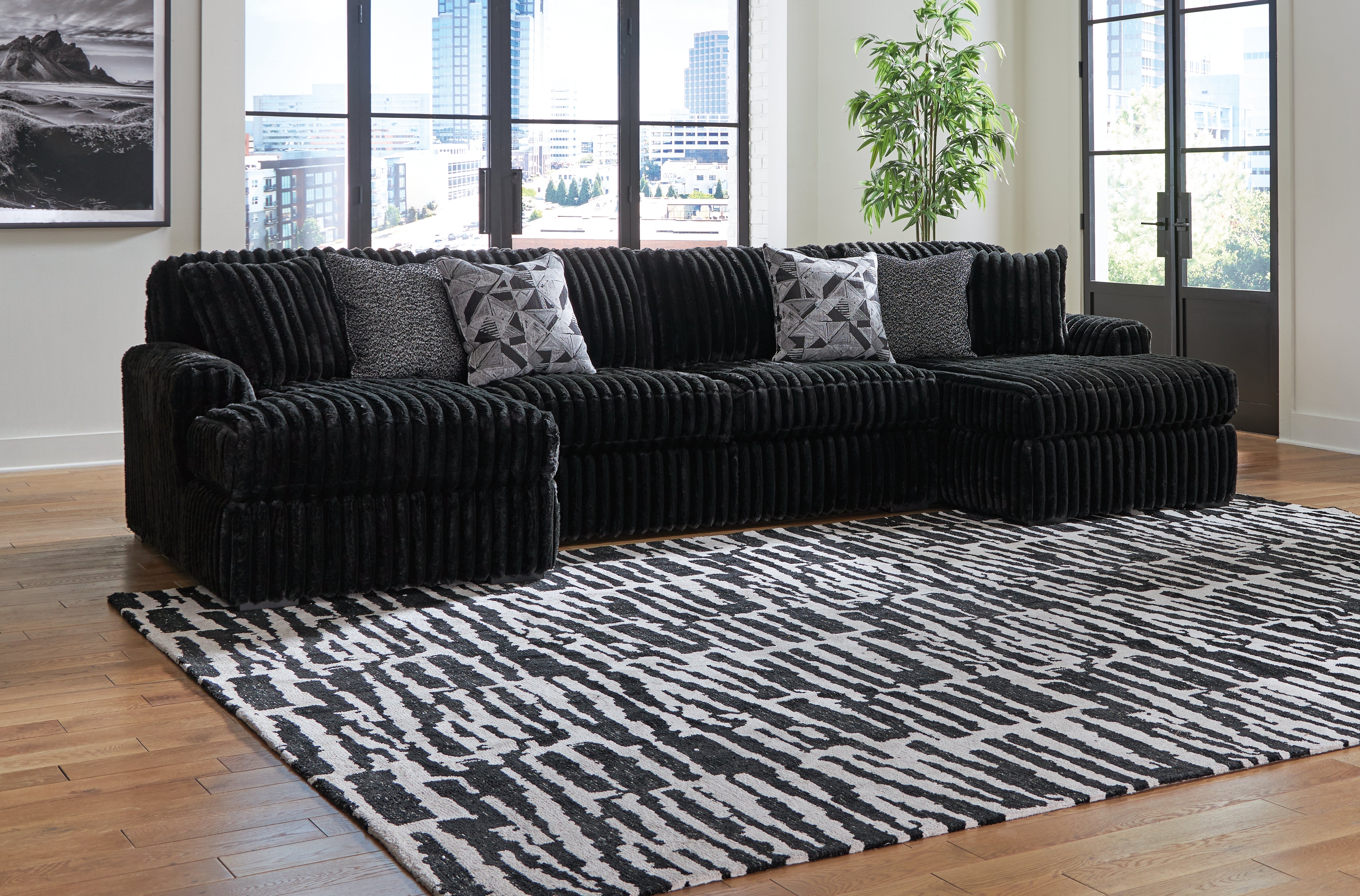 Prime Furniture - Ashley Furniture - Midnight-Madness Sectional - RAF 3-Piece Sectional with Chaise / Onyx - 98103S5