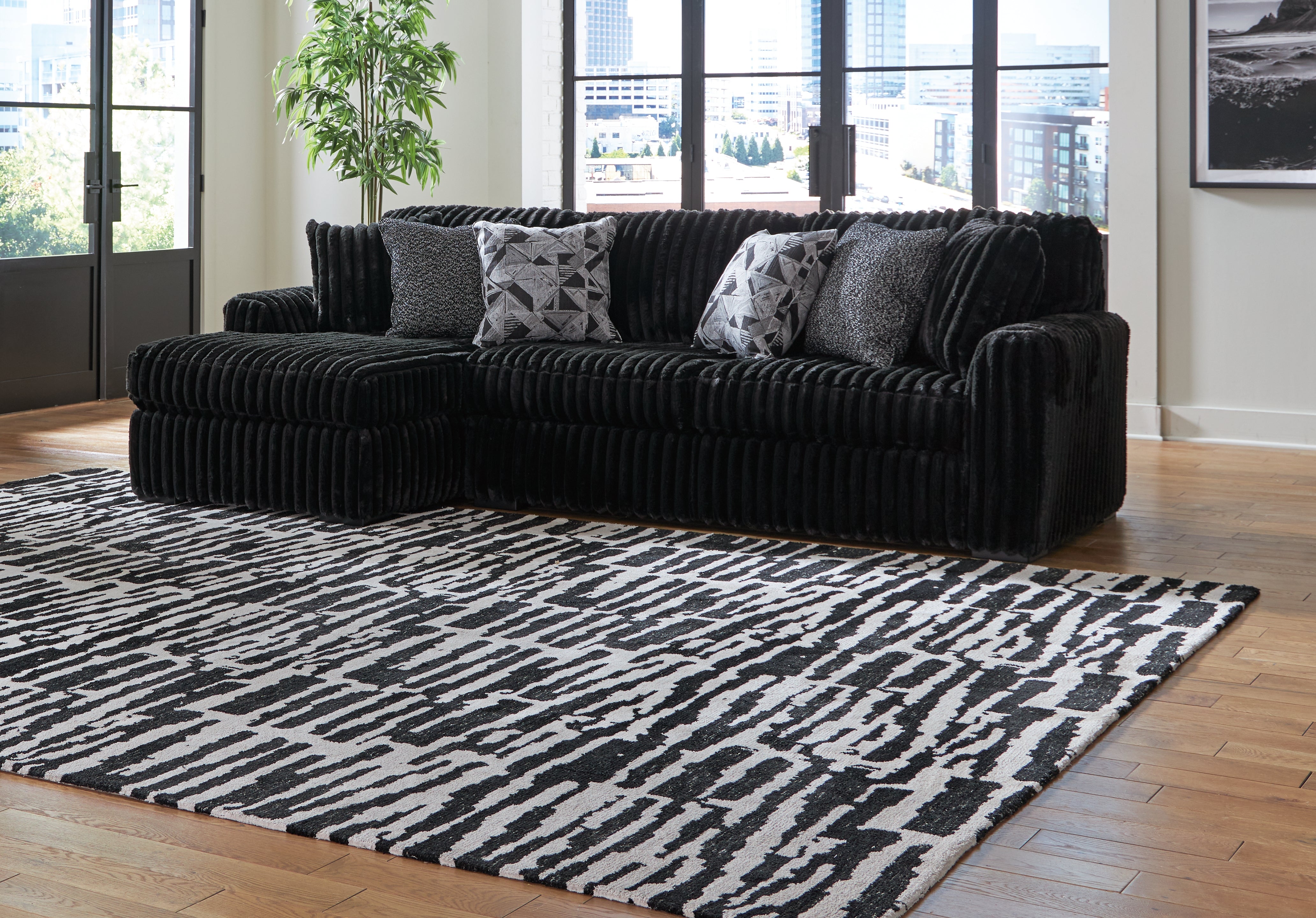Prime Furniture - Ashley Furniture - Midnight-Madness Sectional - RAF 2-Piece Sectional Sofa with Chaise / Onyx - 98103S1