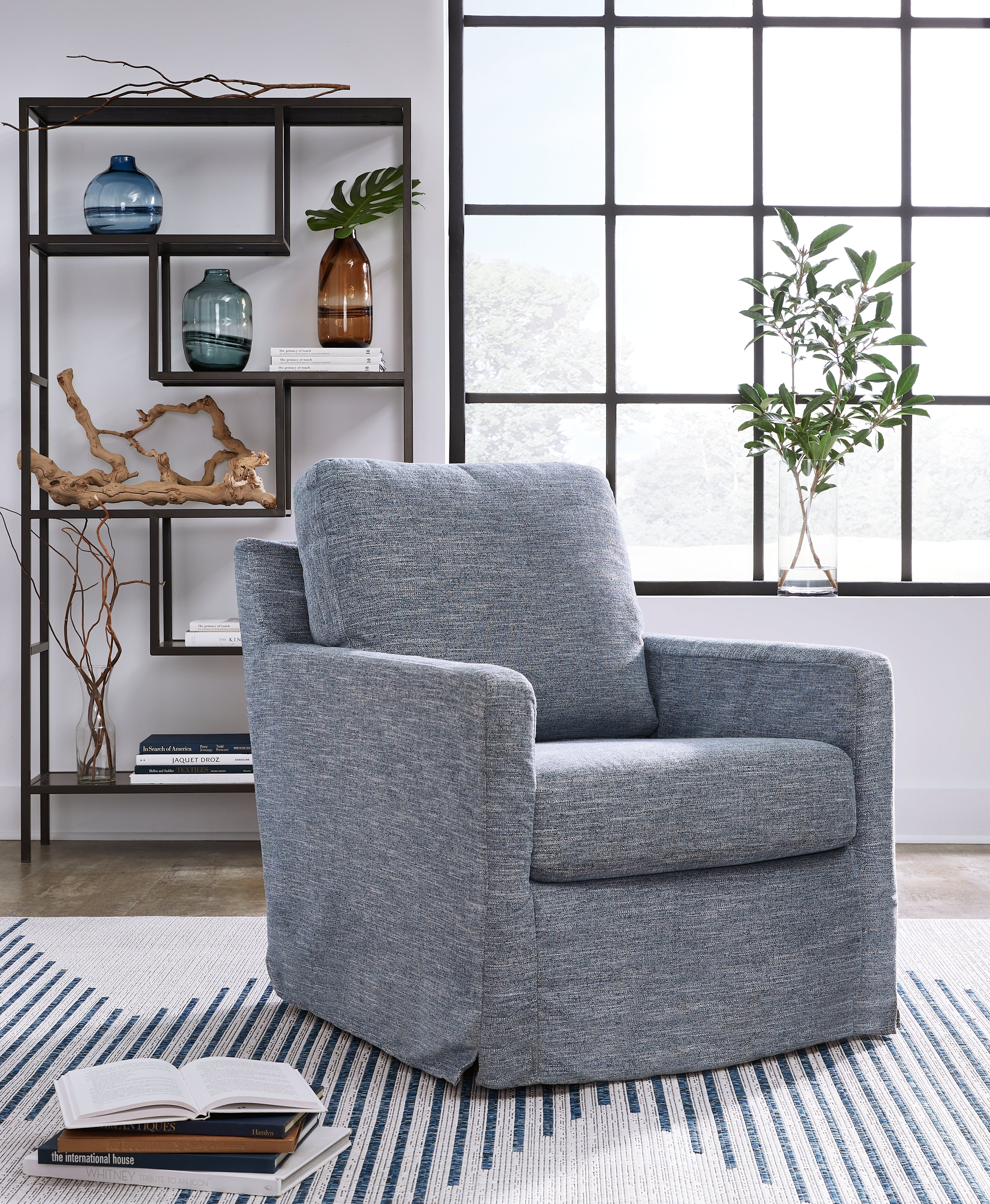 Prime Furniture - Ashley Furniture - Nenana Next-Gen Nuvella Swivel Glider Accent Chair - Swivel Glider Accent Chair / Denim - A3000646