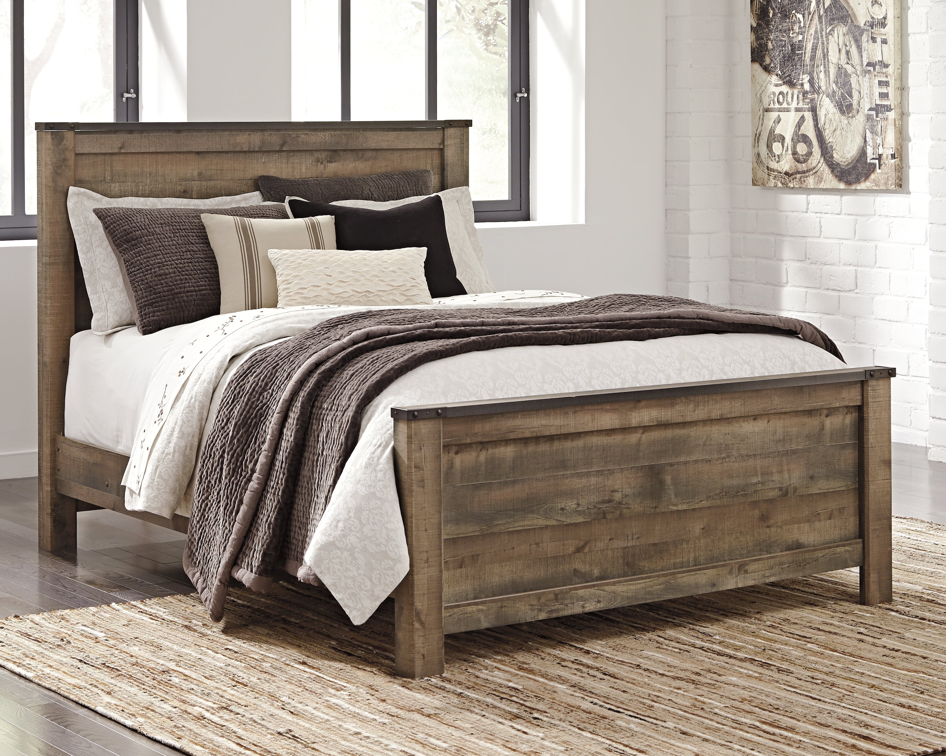 Prime Furniture - Ashley Furniture - Trinell Bedroom - Queen Panel Bed / Brown - B446B11