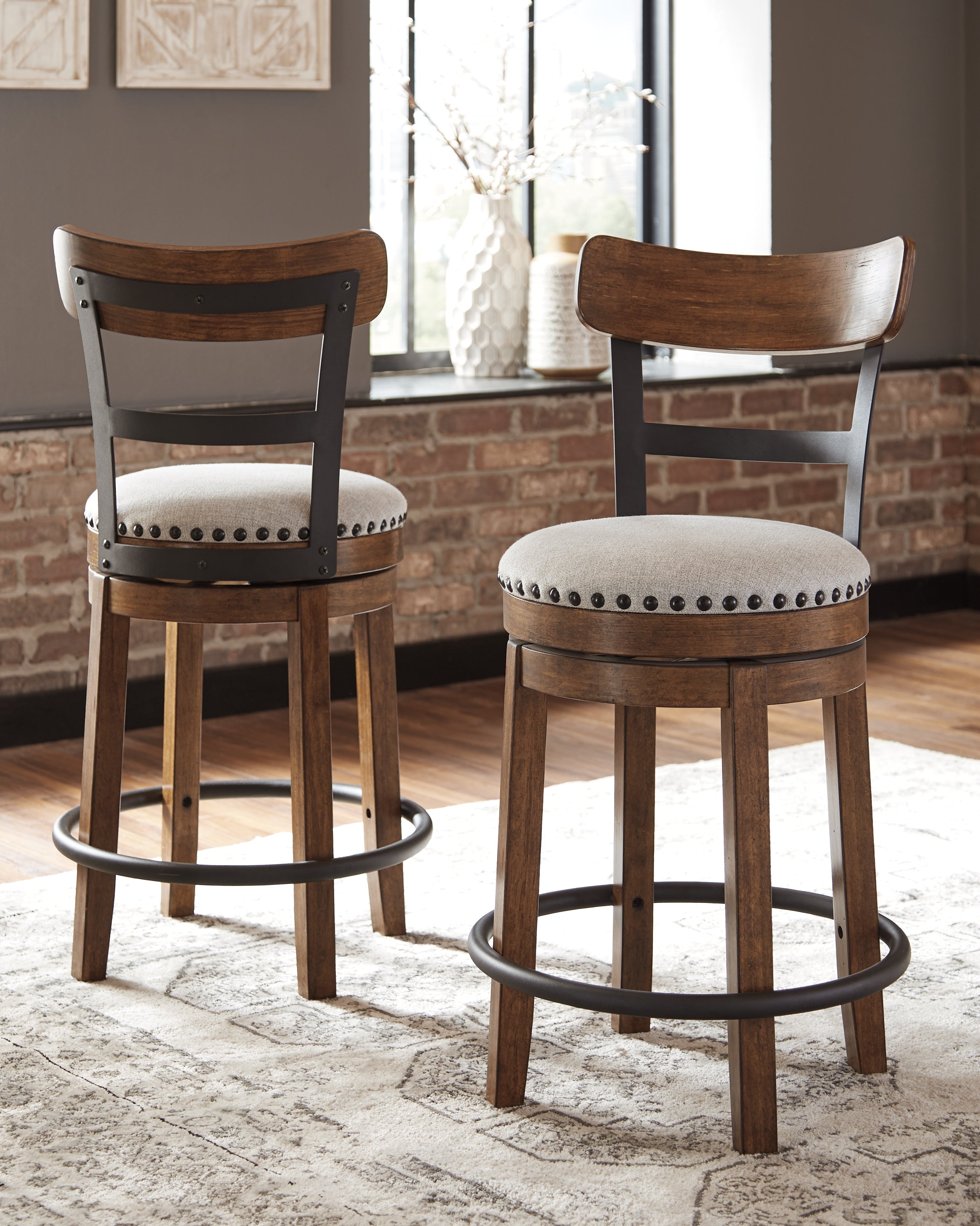 Prime Furniture - Ashley Furniture - Valebeck Dining Room - UPH Swivel Barstool (1/CN) / Brown - D546-424