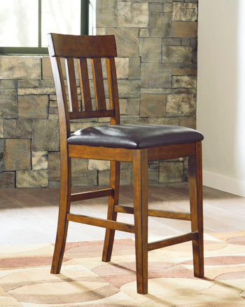 Prime Furniture - Ashley Furniture - Ralene Dining Room - Counter Height Bar Stool (Set of 2) / Medium Brown - D594-124X2