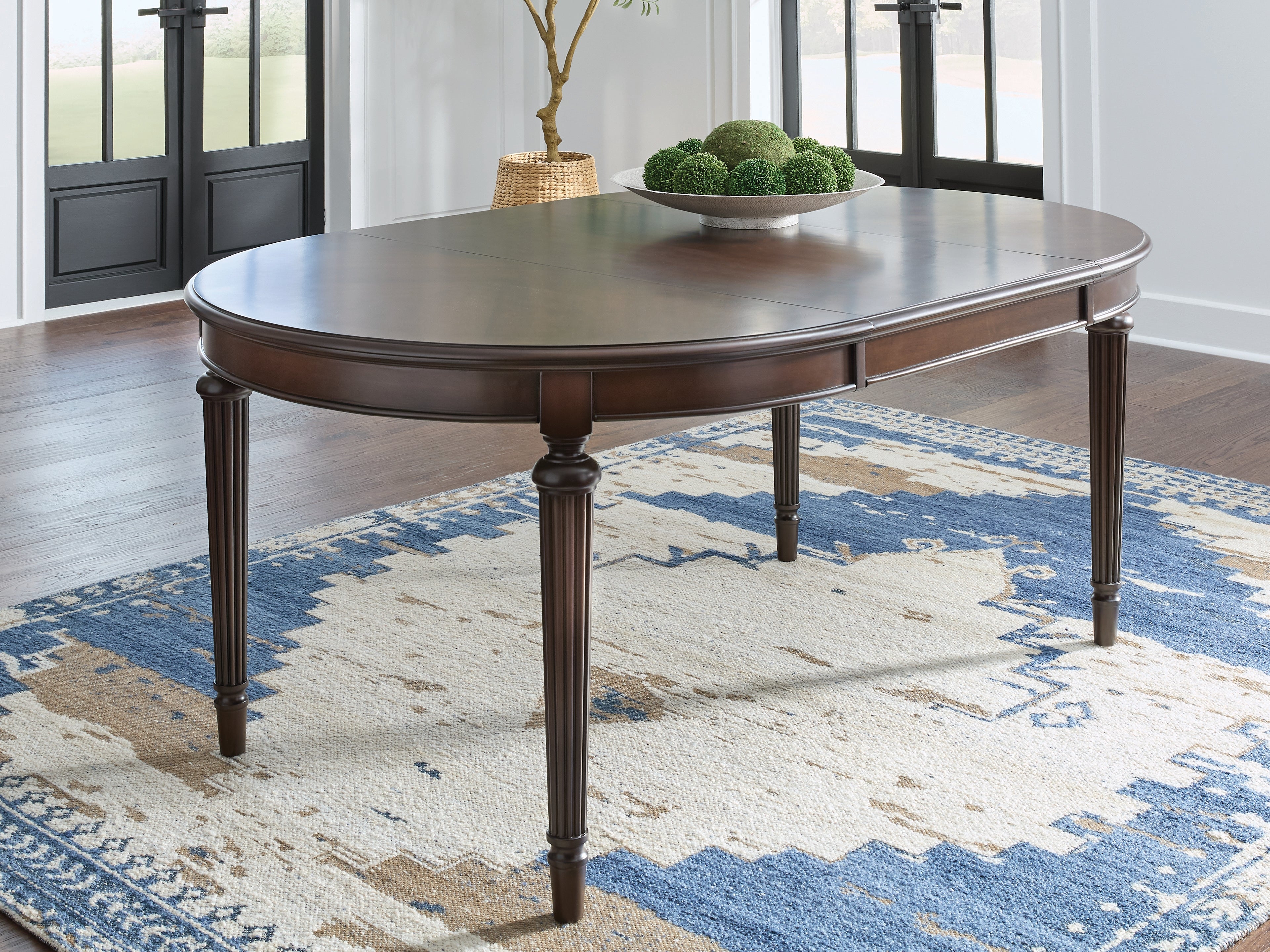 Prime Furniture - Ashley Furniture - Lavinton Dining Room - Oval Dining Room EXT Table / Brown - D764-35