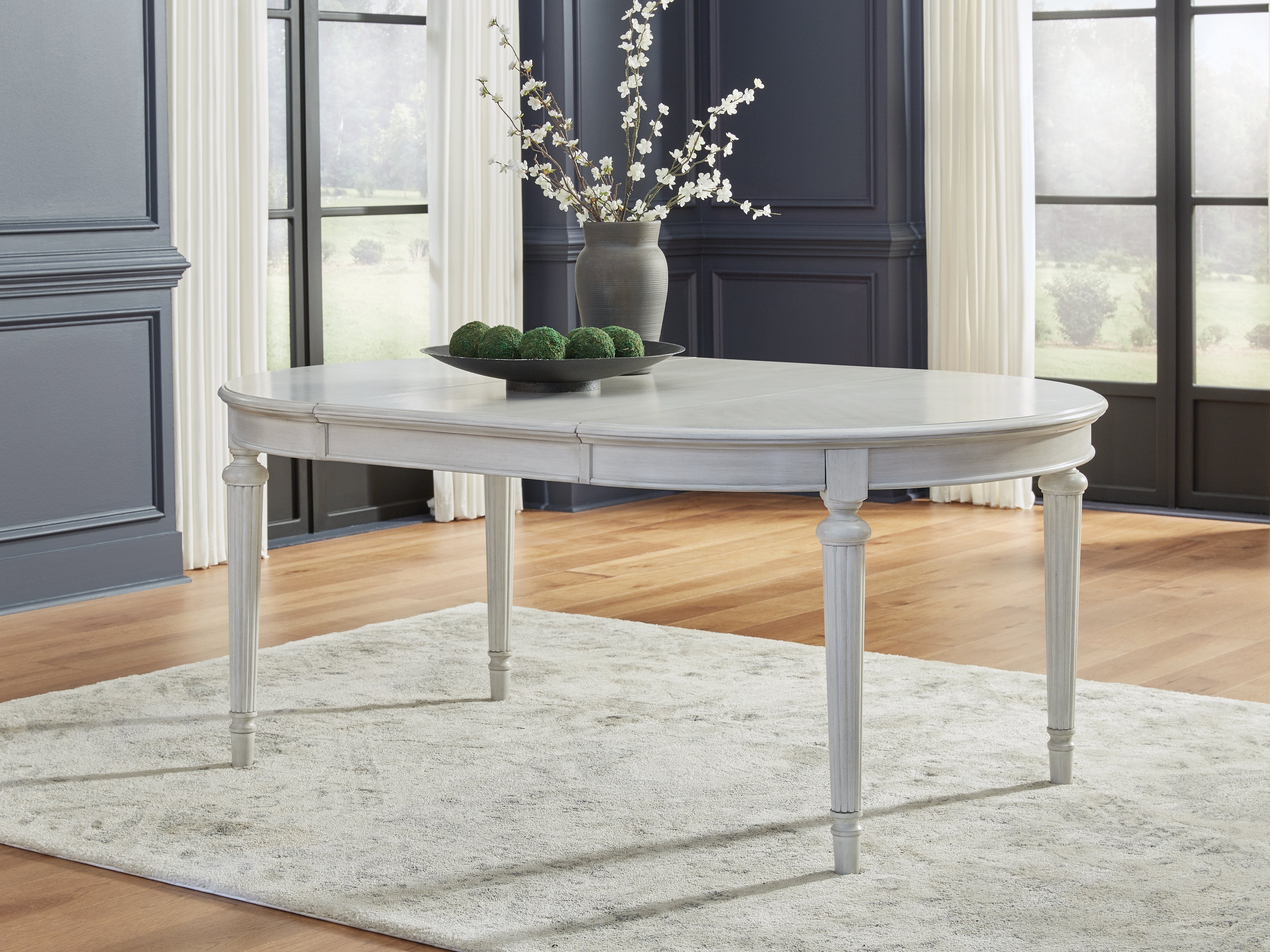 Prime Furniture - Ashley Furniture - Montelaine Dining Room - Oval Dining Room EXT Table / Antique White - D795-35