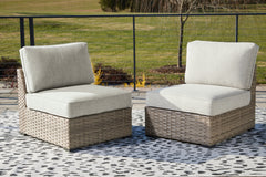 Prime Furniture - Ashley Furniture - Calworth Outdoor - Armless Chair w/Cushion (Set of 2) / Beige - P458-846