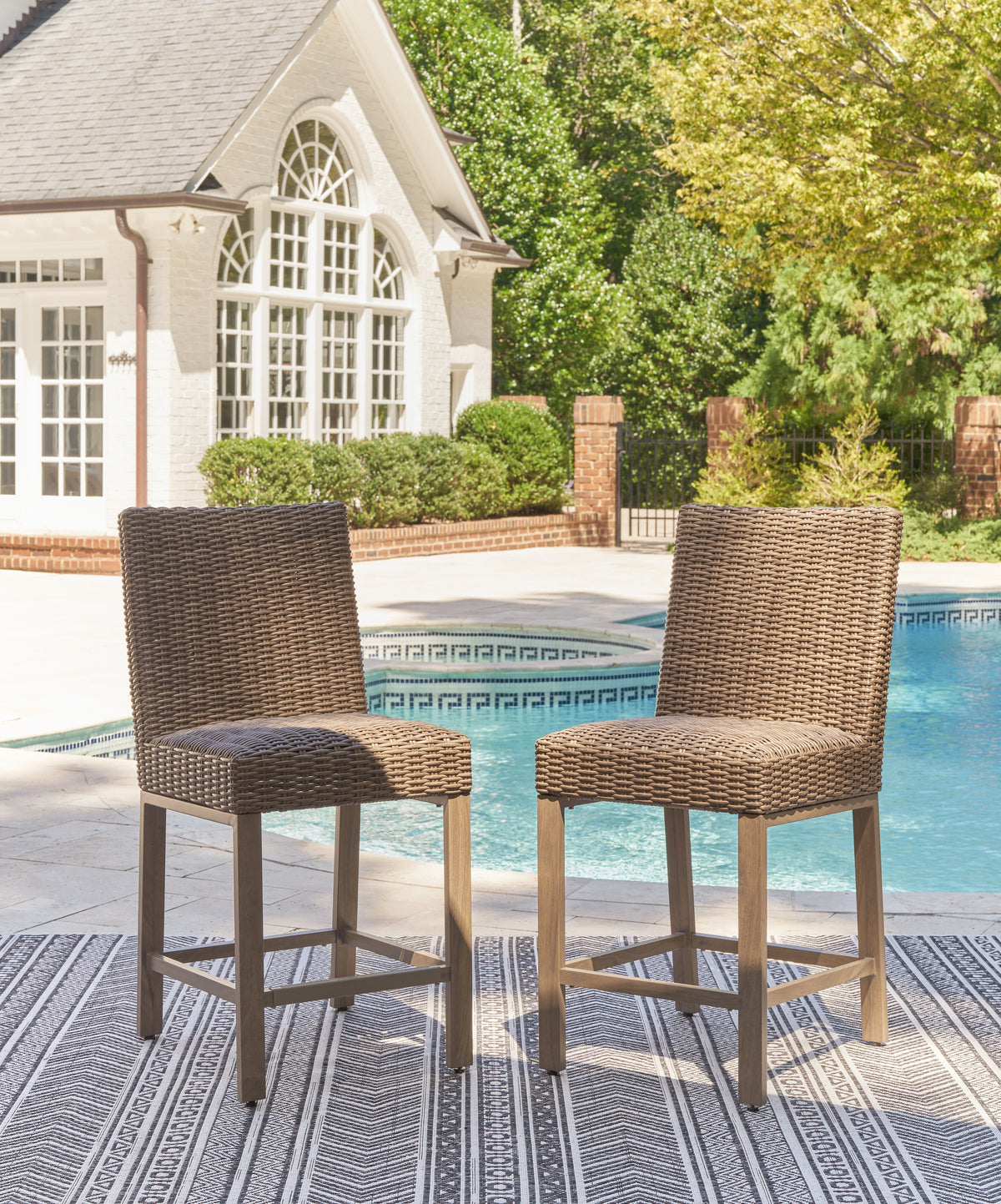 Prime Furniture - Ashley Furniture - Walton Bridge Outdoor - Barstool (Set of 2) / Driftwood - P749-130