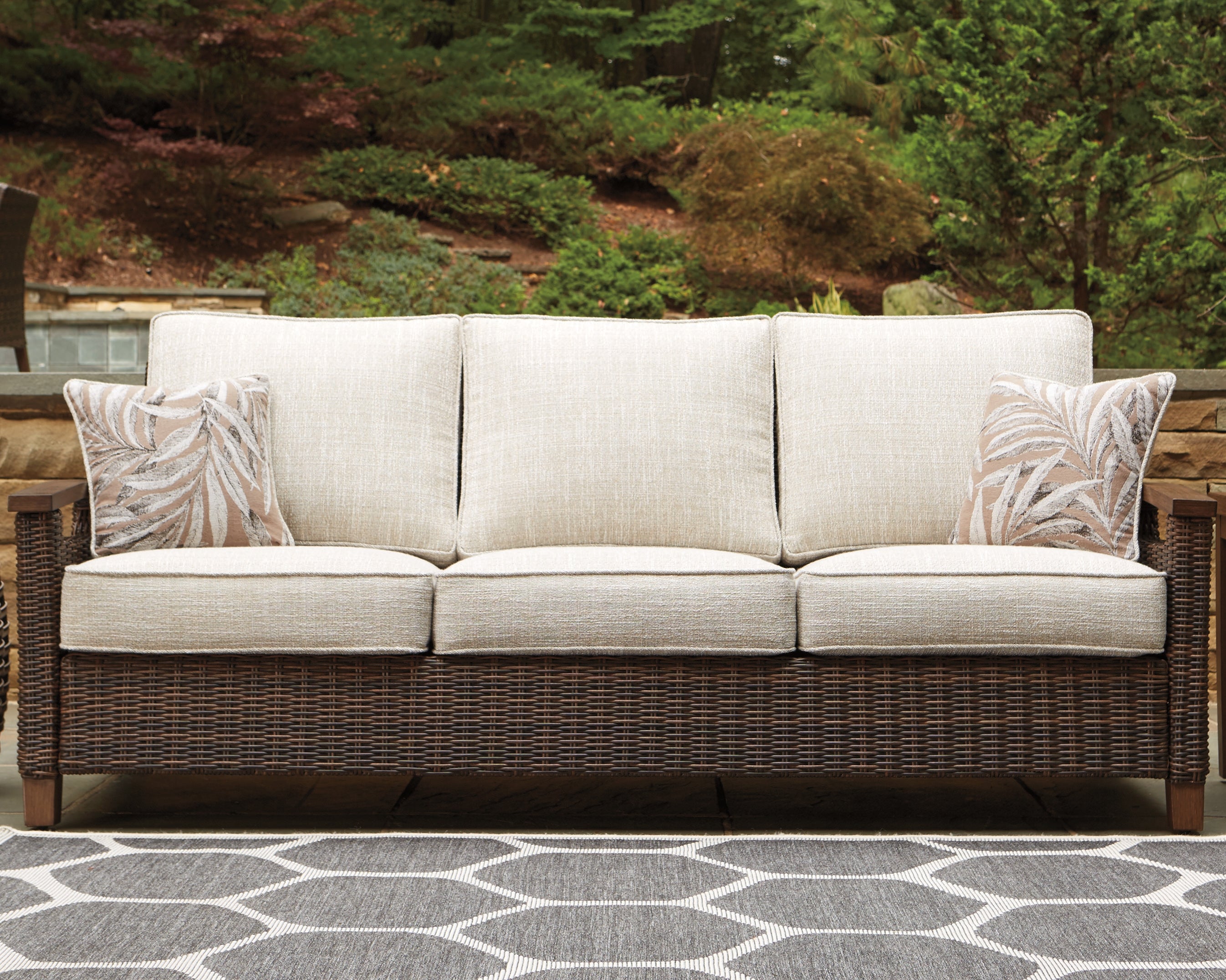 Prime Furniture - Ashley Furniture - Paradise Trail Outdoor - Sofa with Cushion / Medium Brown - P750-838