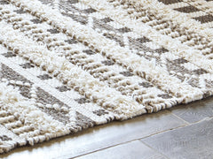 Prime Furniture - Ashley Furniture - Karalee Rug - 5' x 7' Rug / Ivory/Brown - R404442