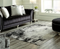 Prime Furniture - Ashley Furniture - Zekeman Rug - 7'10" x 10' Rug / Black/Cream/Gray - R404921