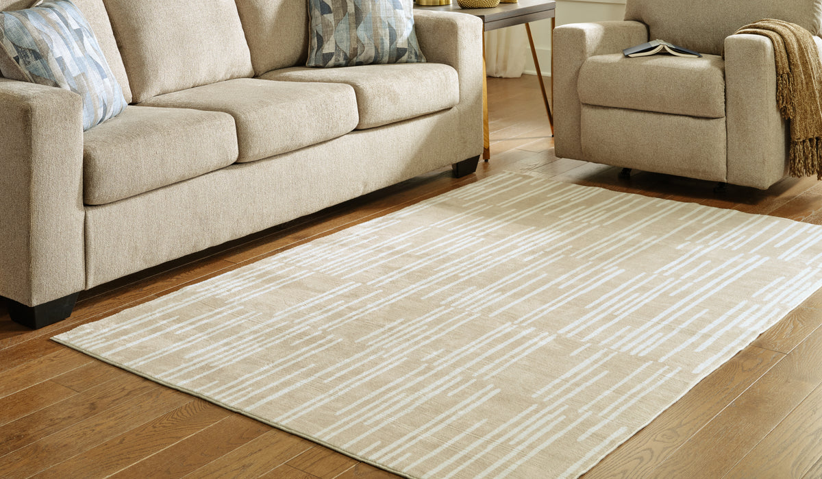 Prime Furniture - Ashley Furniture - Ardenville Rug - 5' x 7'1" Washable Rug / Tan/Cream - R406212