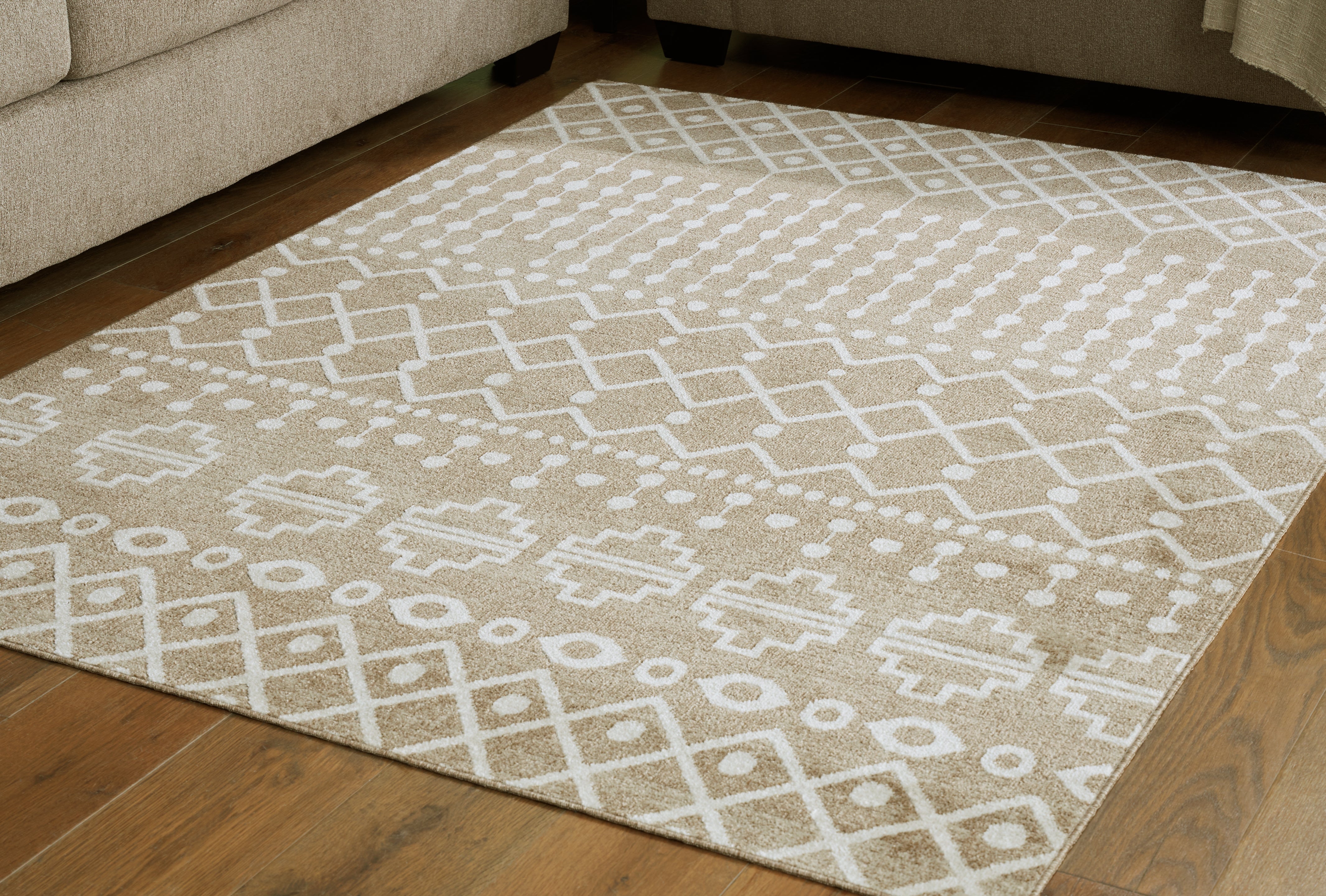 Prime Furniture - Ashley Furniture - Bunchly Rug - 4'11" x 7'2" Washable Rug / Tan/Brown/Cream - R406222