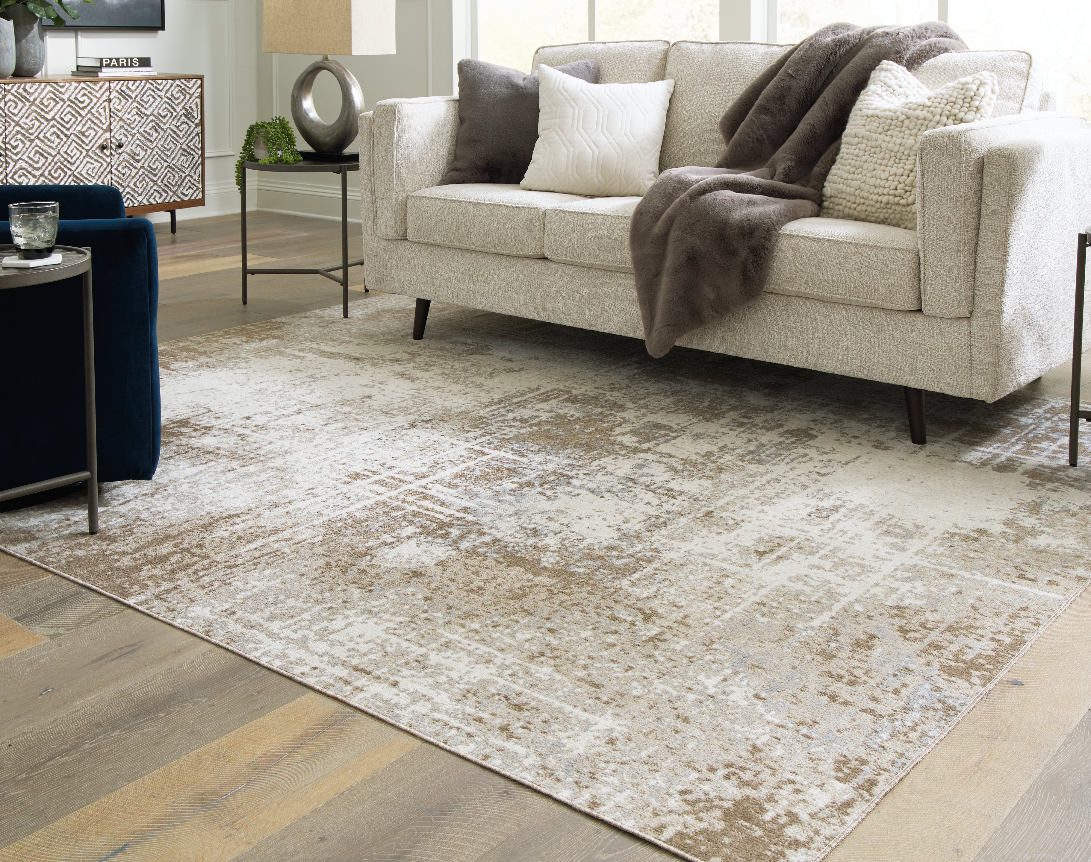 Prime Furniture - Ashley Furniture - Grifflain Rug - 7'10" x 10'3" Washable Rug / Tan/Brown/Gray - R406231