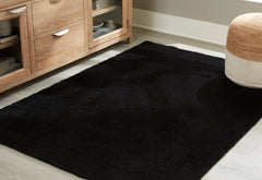 Prime Furniture - Ashley Furniture - Anaben Rug - 5' x 7' Washable Rug / Black - R406312