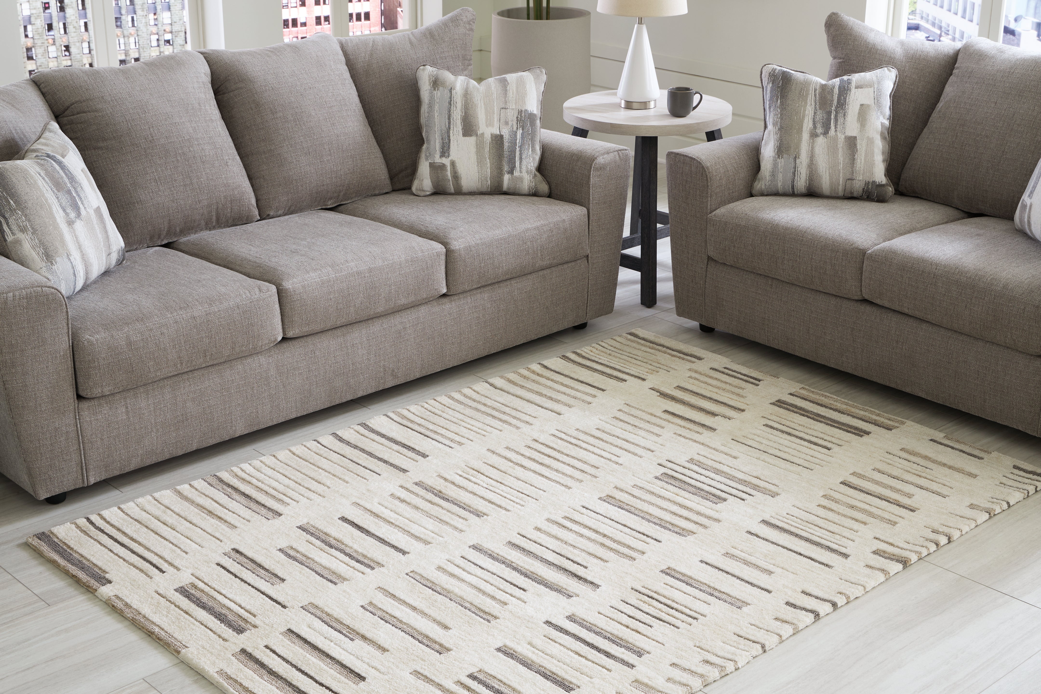 Prime Furniture - Ashley Furniture - Leesdale Rug - 5' x 7' Rug / Ivory/Brown/Black - R406422