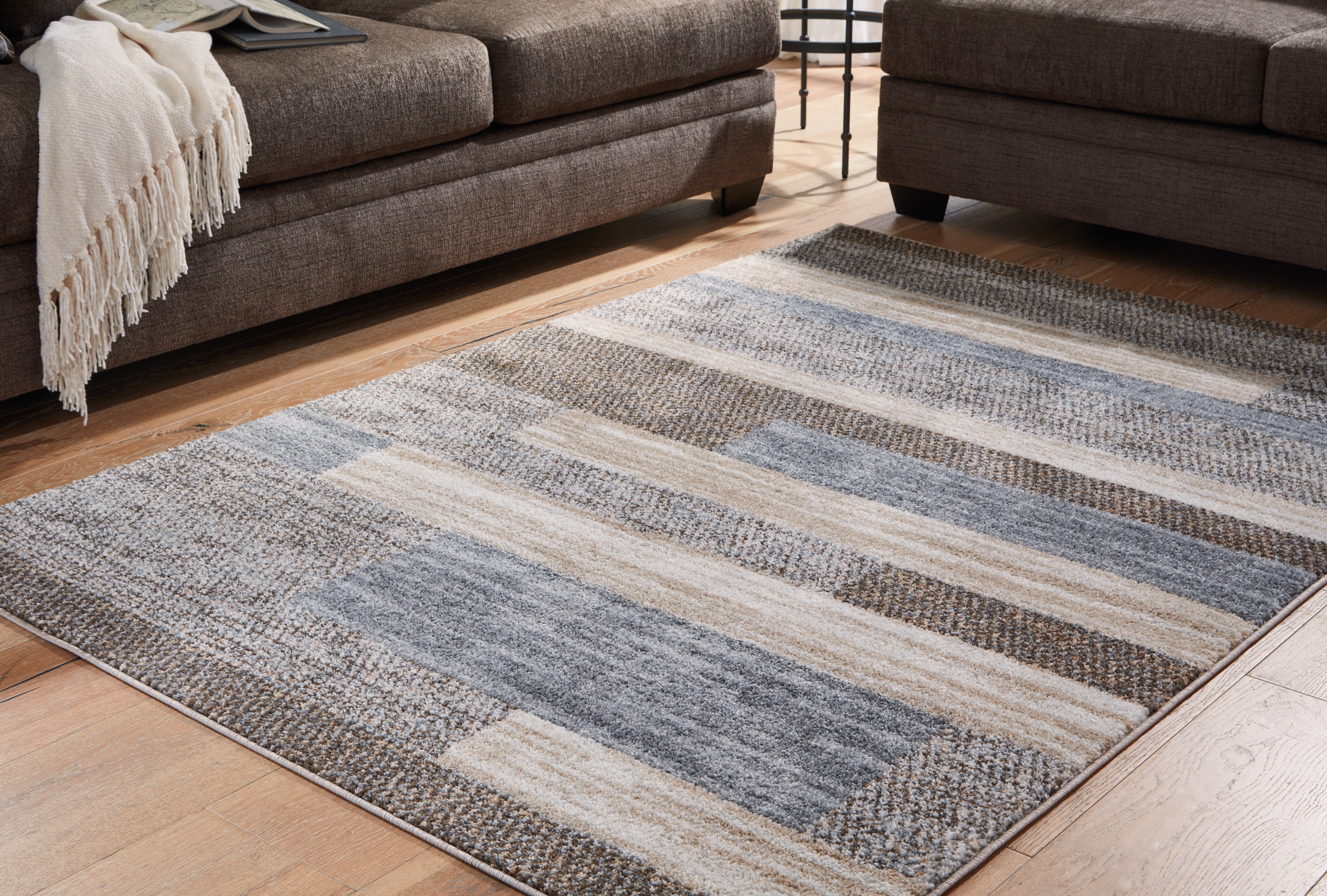 Prime Furniture - Ashley Furniture - Sethburn Rug - 8' x 10' Rug / Cream/Brown/Gray - R406591