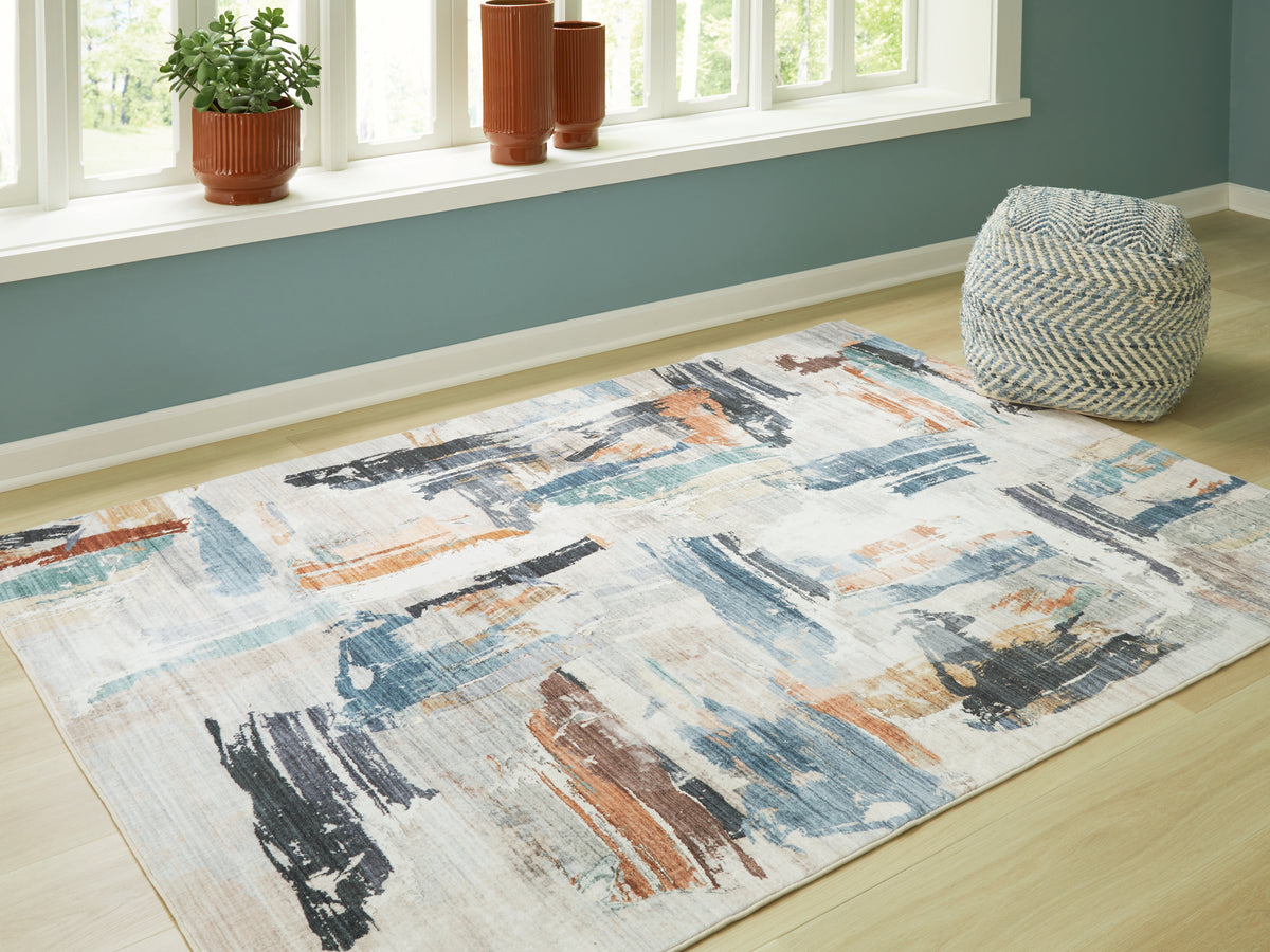 Prime Furniture - Ashley Furniture - Hessland Rug - 8' x 10' Washable Rug / Multi - R407051