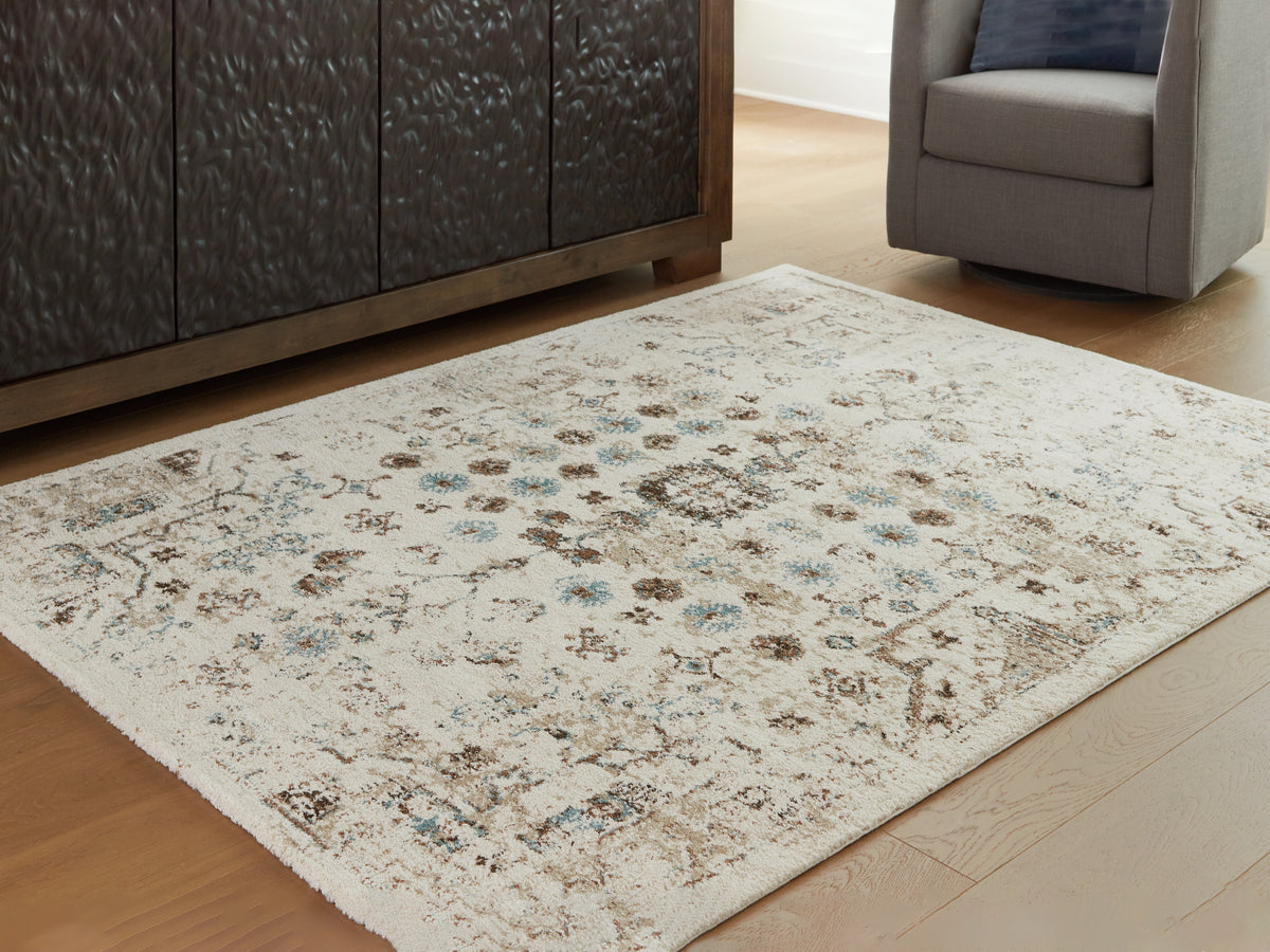 Prime Furniture - Ashley Furniture - Jossler Rug - 8' x 10' Rug / Ivory/Brown/Teal - R407071