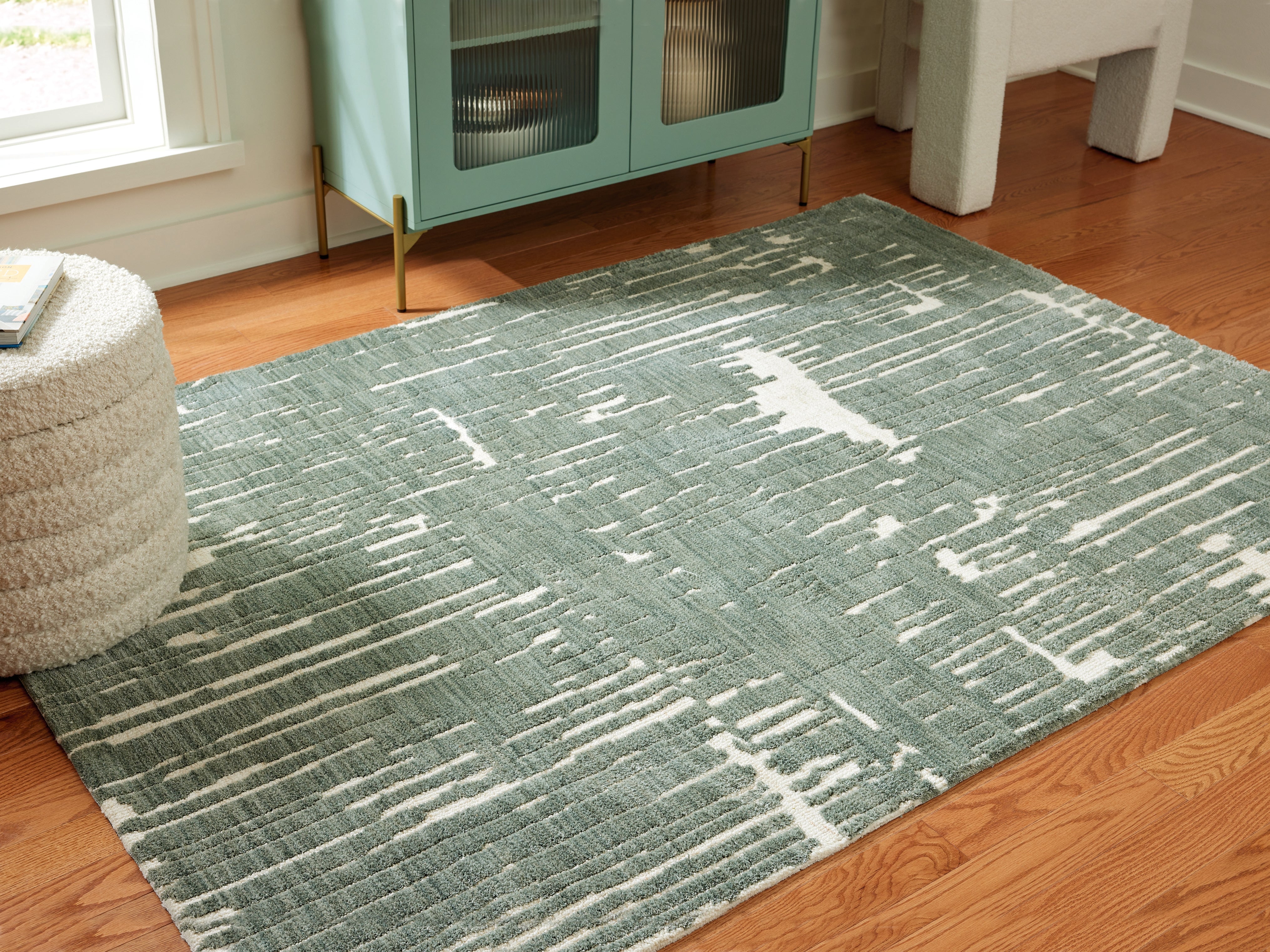 Prime Furniture - Ashley Furniture - Cayworth Rug - 5' x 7' Rug / Teal/White - R407092
