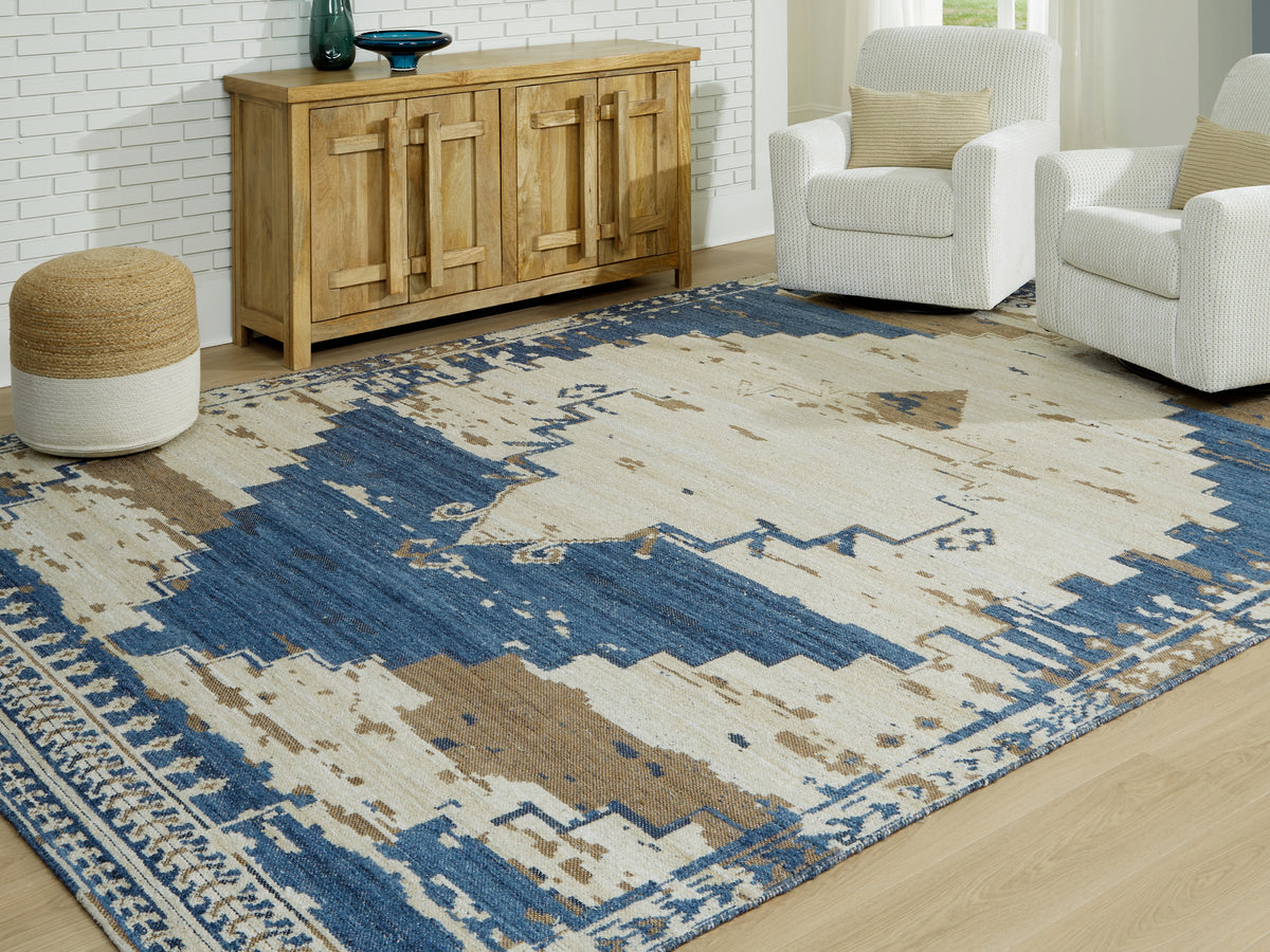 Prime Furniture - Ashley Furniture - Varnler Rug - 5' x 7' Rug / Blue/Brown/Tan - R407132