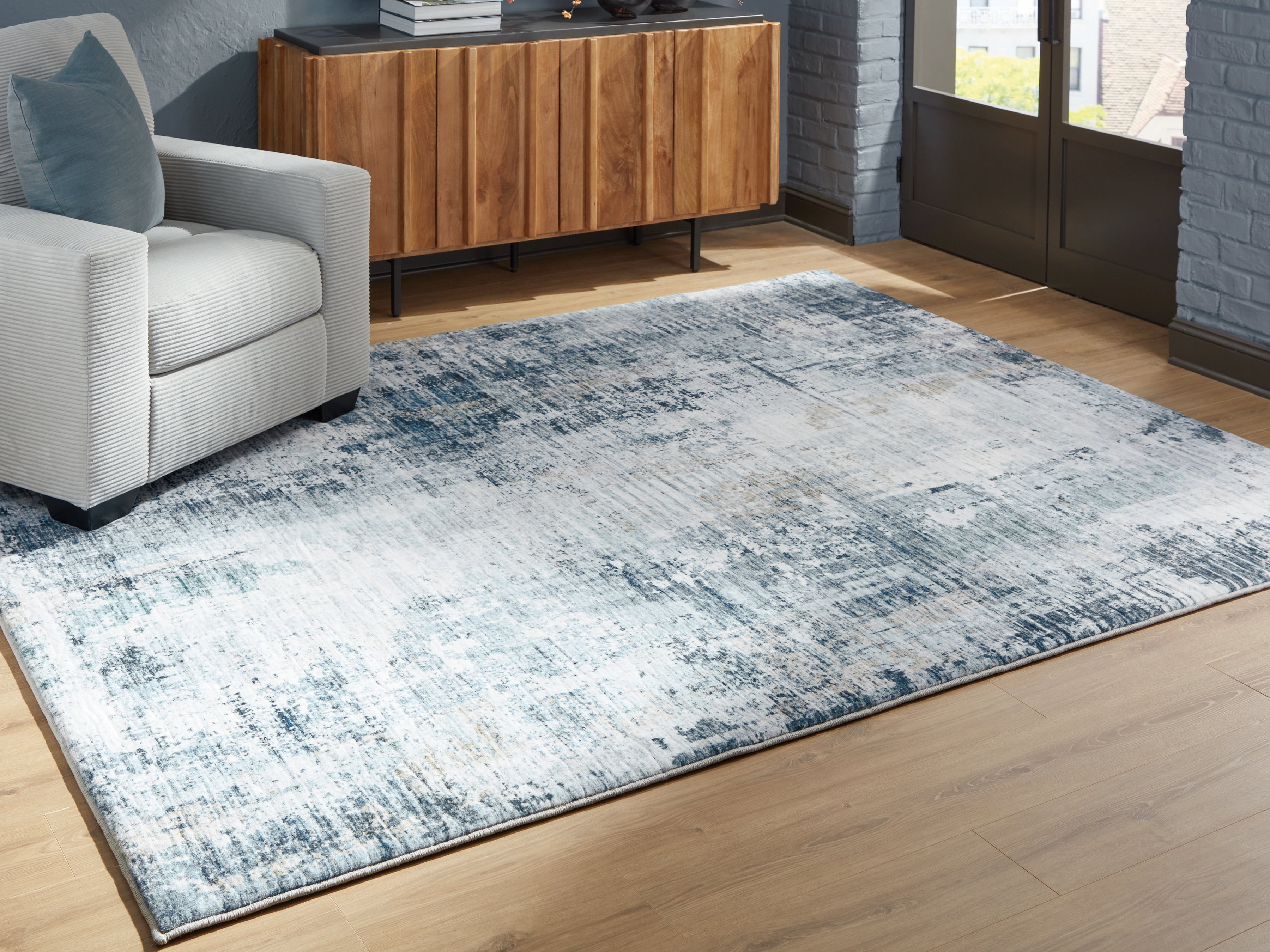 Prime Furniture - Ashley Furniture - Arlenmont Rug - 7'6" x 9'6" Area Rug / Blue/White/Brown - R407481
