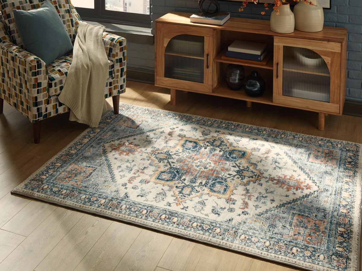 Prime Furniture - Ashley Furniture - Wallney Rug - 5' x 7' Area Rug / Multi - R407492