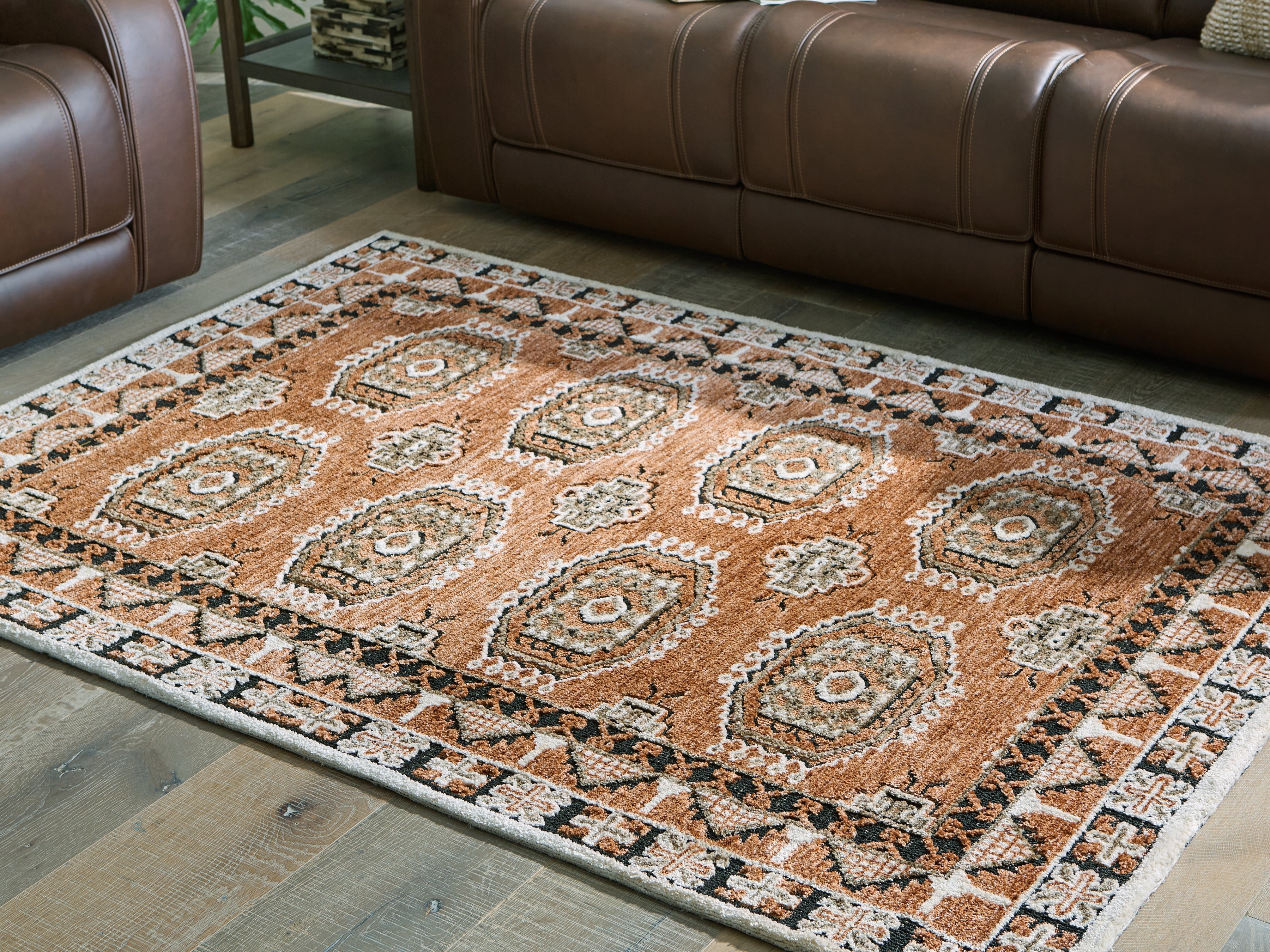 Prime Furniture - Ashley Furniture - Qaabiz Rug - 5' x 7' Area Rug / Sienna/Ivory/Black - R407522