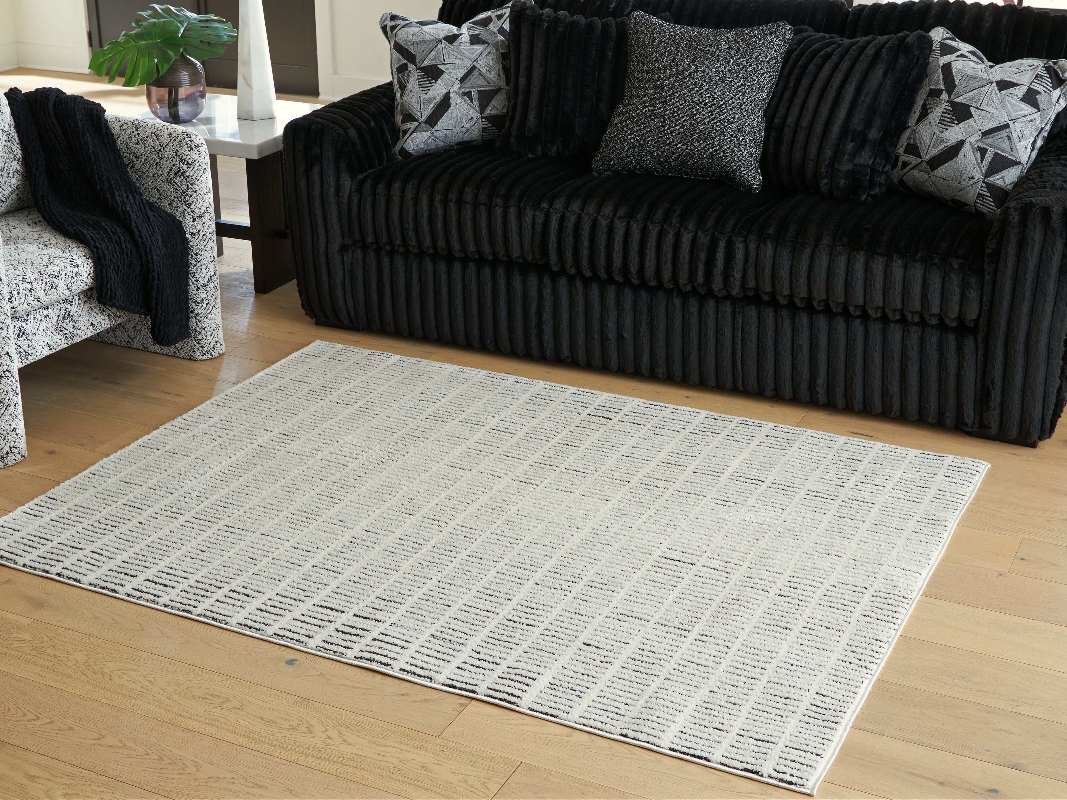 Prime Furniture - Ashley Furniture - Turinwith Rug - 5'3" x 7' Area Rug / Ivory/Black - R407552
