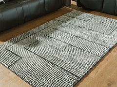 Prime Furniture - Ashley Furniture - Kurtmen Rug - 7'10" x 9'10" Area Rug / Black/Ivory - R407591