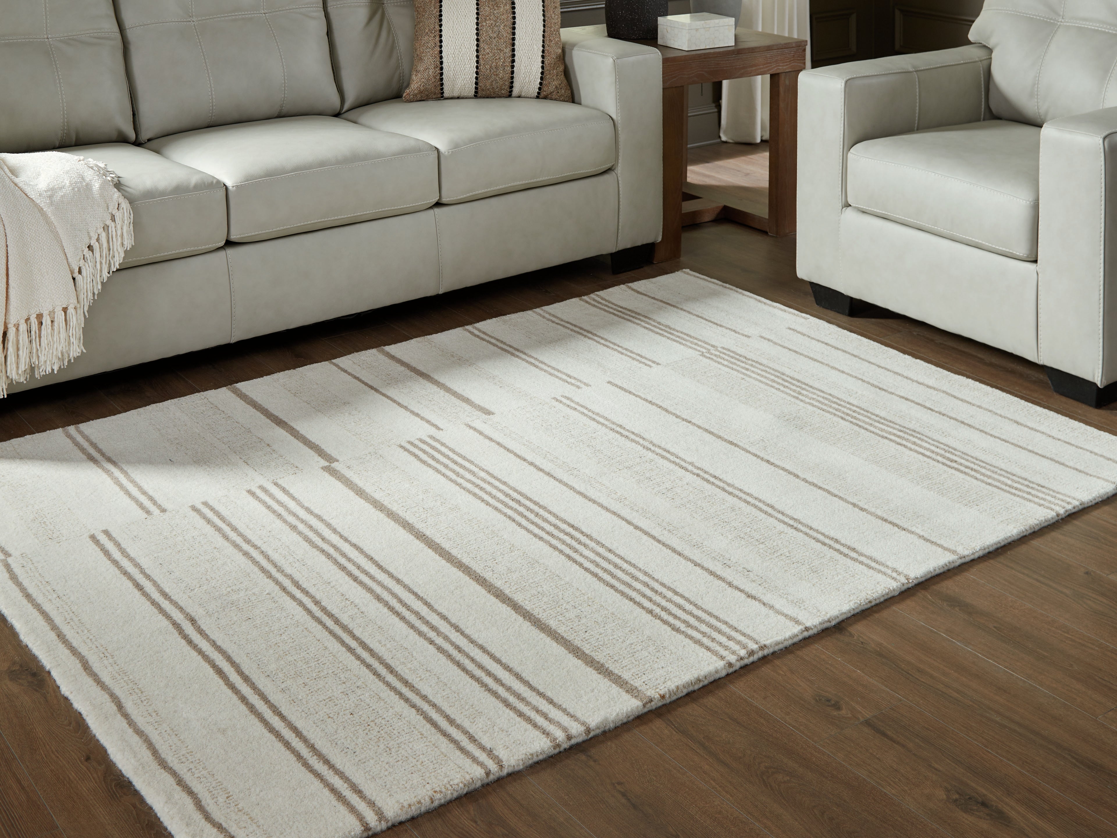 Prime Furniture - Ashley Furniture - Gadence Rug - 7'8" x 10' Area Rug / Ivory/Tan - R407641