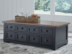 Prime Furniture - Ashley Furniture - Wildenauer Lift-Top Coffee Table - Lift Top Cocktail Table / Brown/Black - T664-9