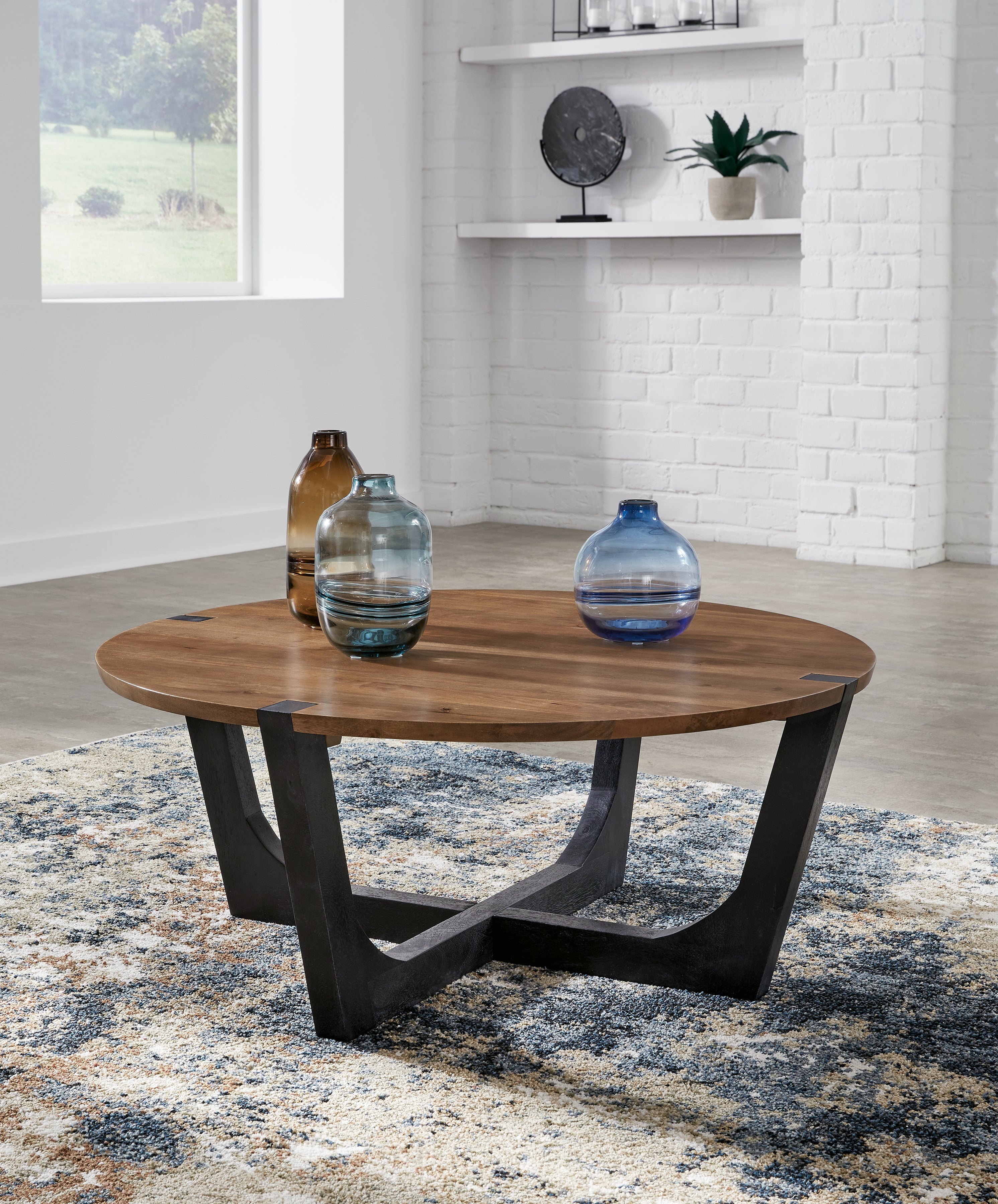 Prime Furniture - Ashley Furniture - Hanneforth Coffee Table - Round Cocktail Table / Brown/Black - T726-8