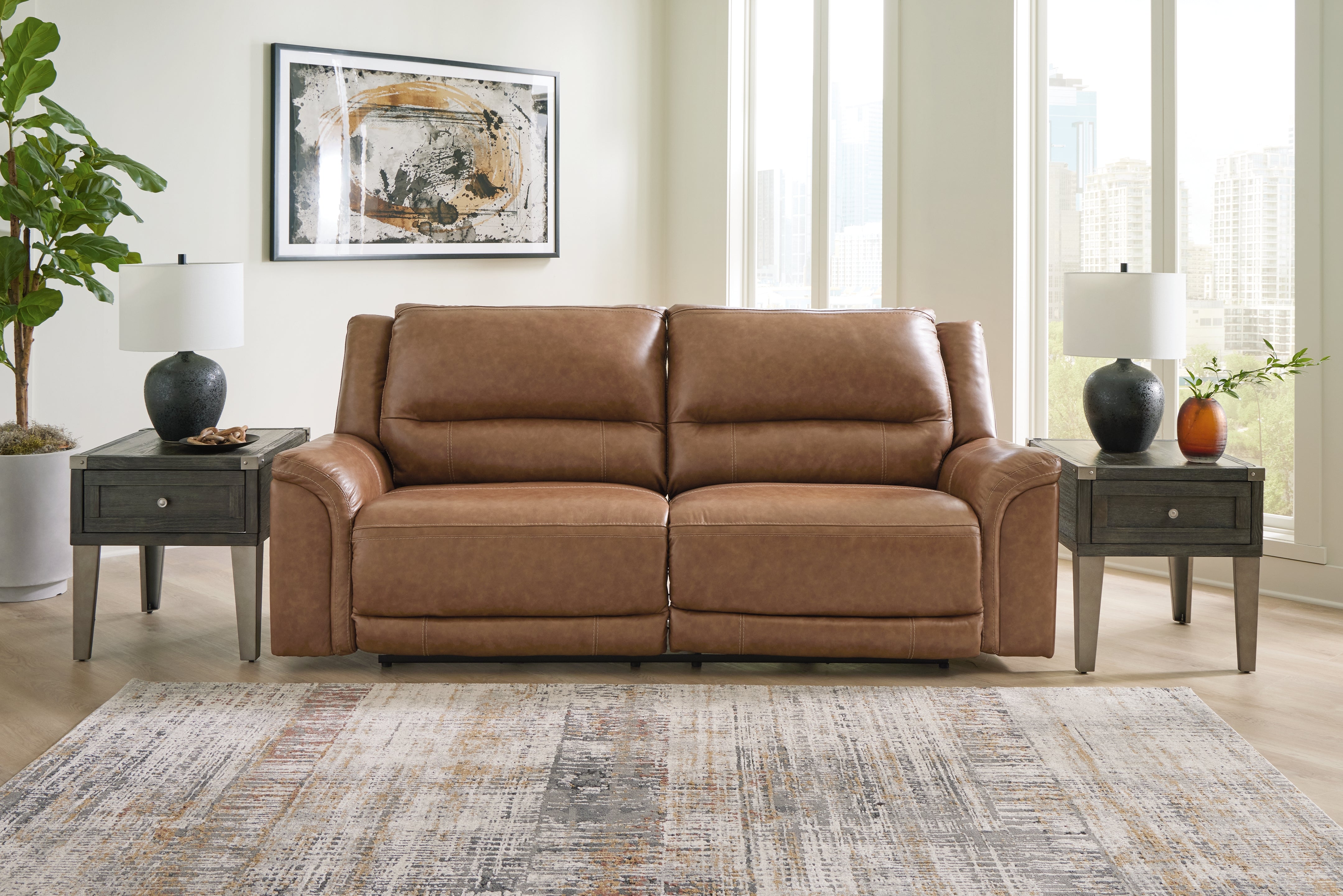 Prime Furniture - Ashley Furniture - Trasimeno Living Room - 2 Seat PWR REC Sofa ADJ HDREST / Caramel - U8281547