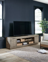 Prime Furniture - Ashley Furniture - Krystanza 92" TV Stand - 92" / Weathered Gray - W760-78